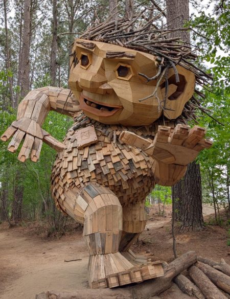 Giant troll, named DAX, built by artist Thomas Dambo with recycled materials